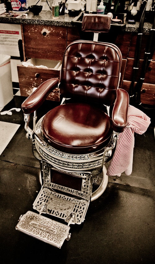 AoM_Shaving-83 A metal casing chair at barbershop.