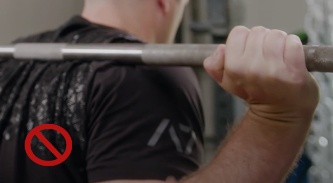 A man with wrong wrist extension.