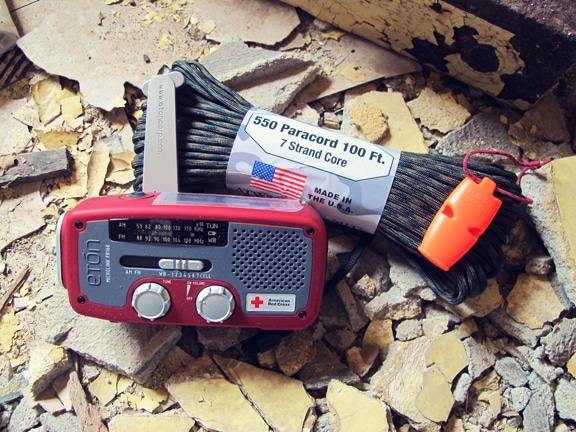 Paracord and emergency radio placed at disaster house.