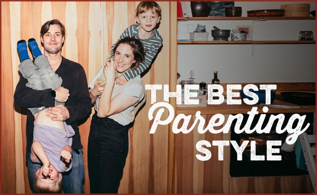 A couple and two children pose playfully in front of a wooden wall. The father holds one child upside down while the mother cuddles the other. Text reads, "Discover the Best Parenting Style.