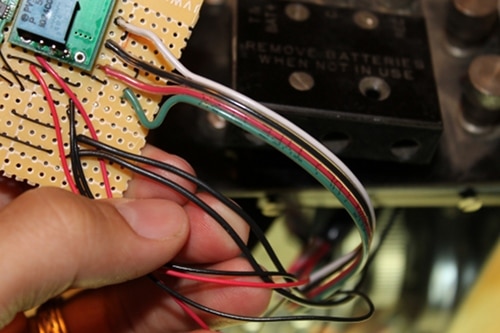 Vintage connecting the speaker cable green to the speaker out terminal on the bluetooth chip.