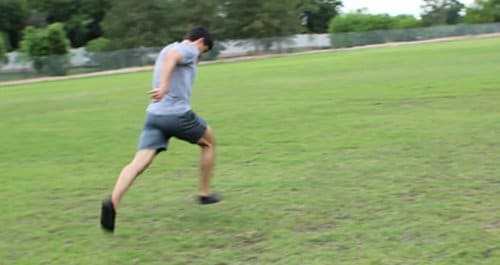 Vintage man running in the ground.