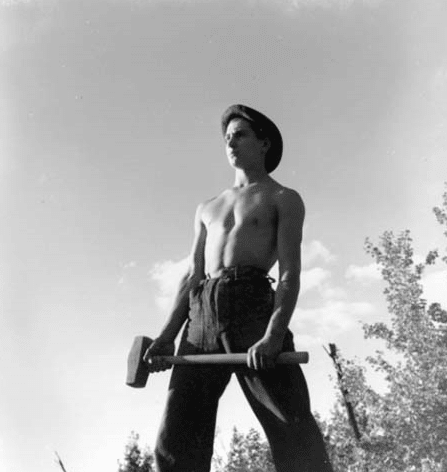 CCC Man holding hammer in his hands.