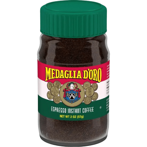 A jar of Medaglia D’Oro Instant Coffee with a green lid and a red, white, and green label, displaying the brand logo and net weight of 2 oz (57g), perfect for coffee lovers seeking the best instant coffee experience.